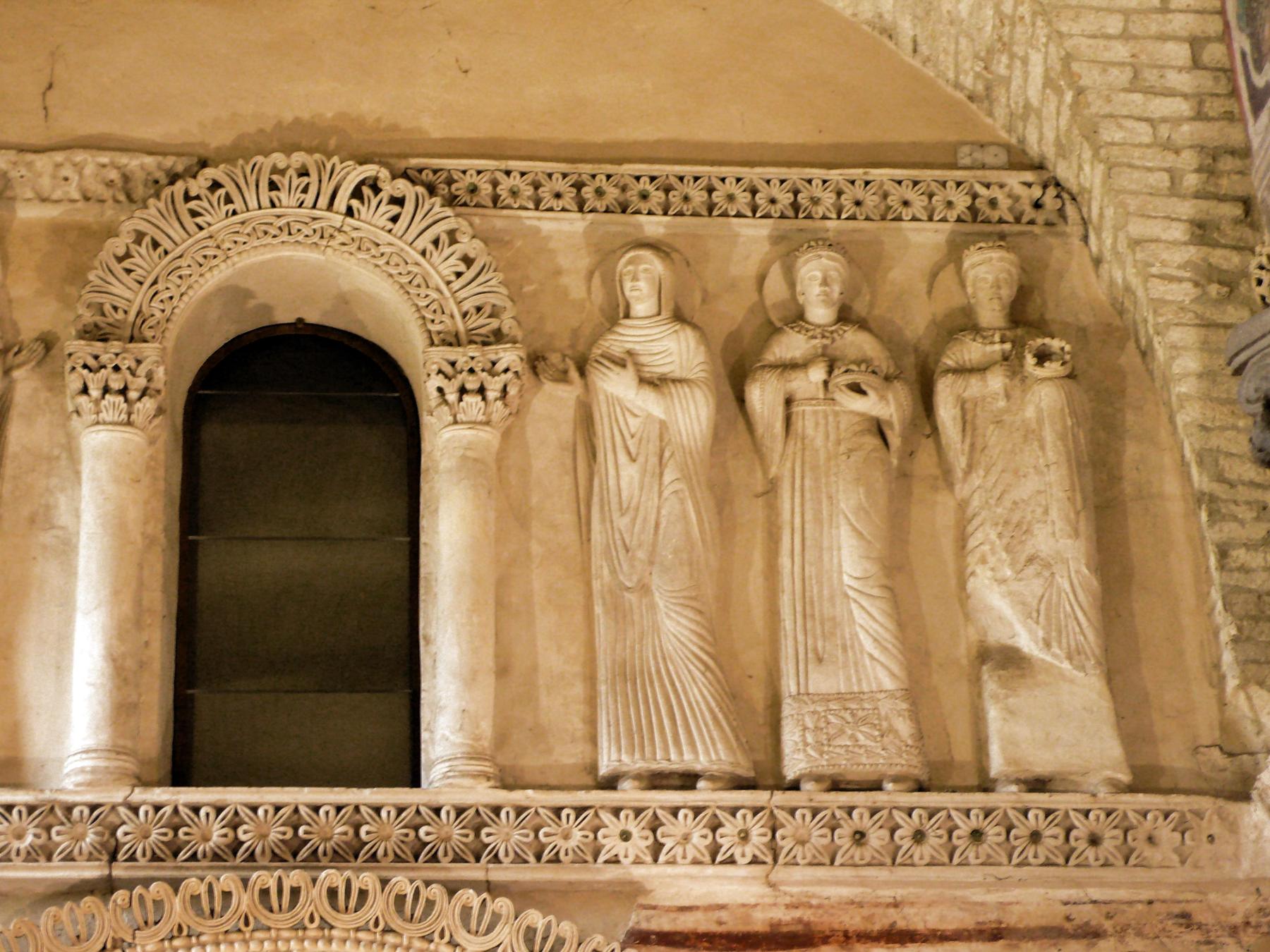 Eighth-century Lombard stucco saints inside the Tempietto Longobardo, Cividale