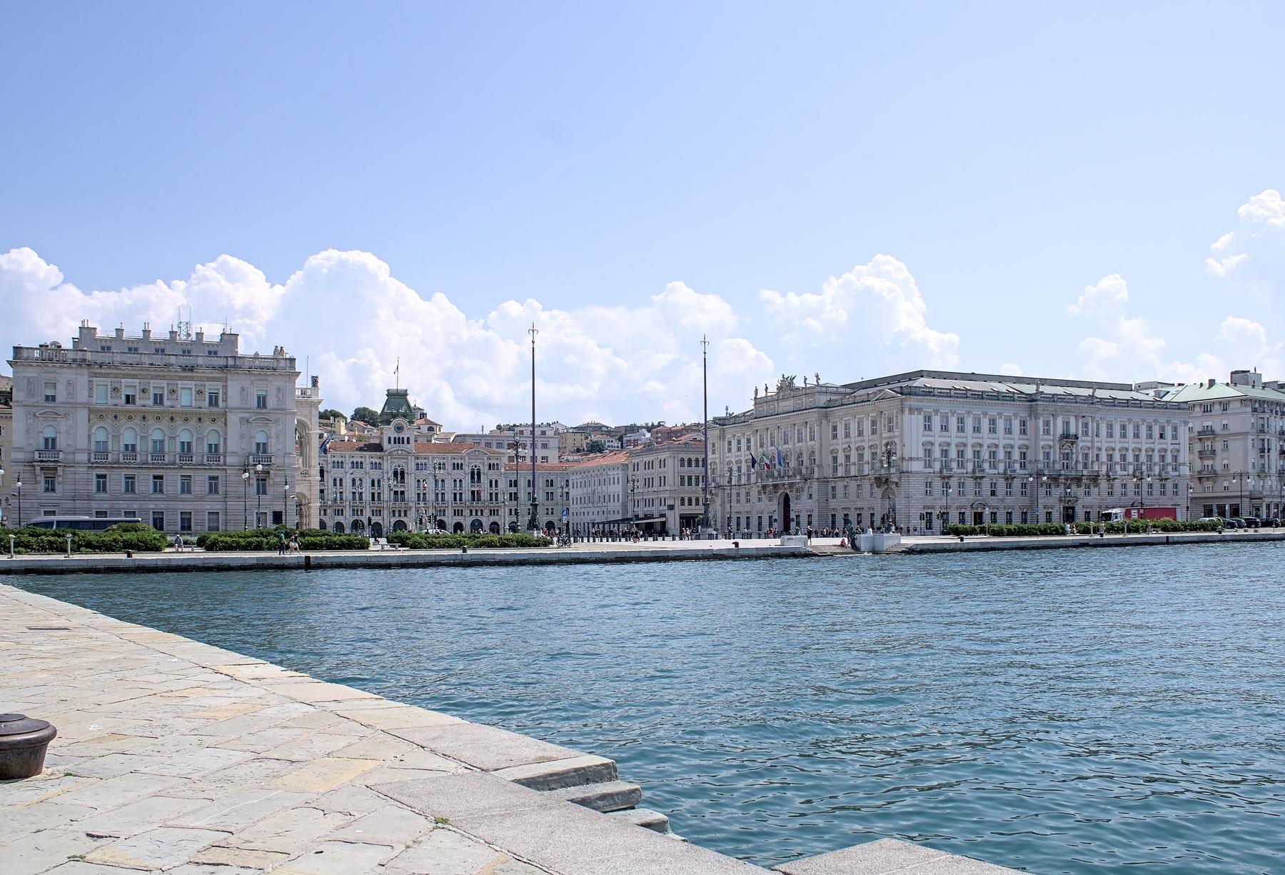 Piazza Unità d'Italia seen across the water from the Trieste waterfront