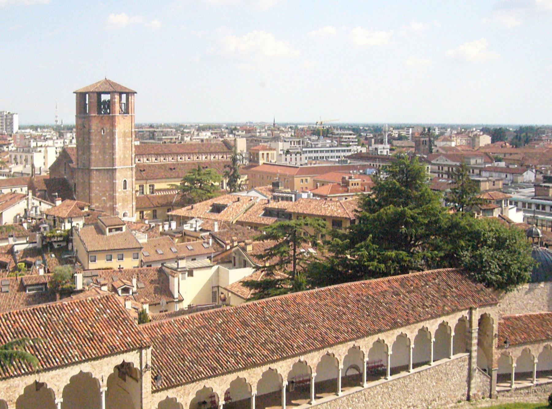 Terracotta rooftops of Udine and the cathedral bell tower seen from the castle